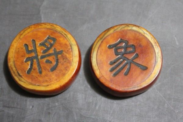 象棋让先一夹二半怎么算（如何在让先一夹二半的象棋比赛中巧妙布局）.